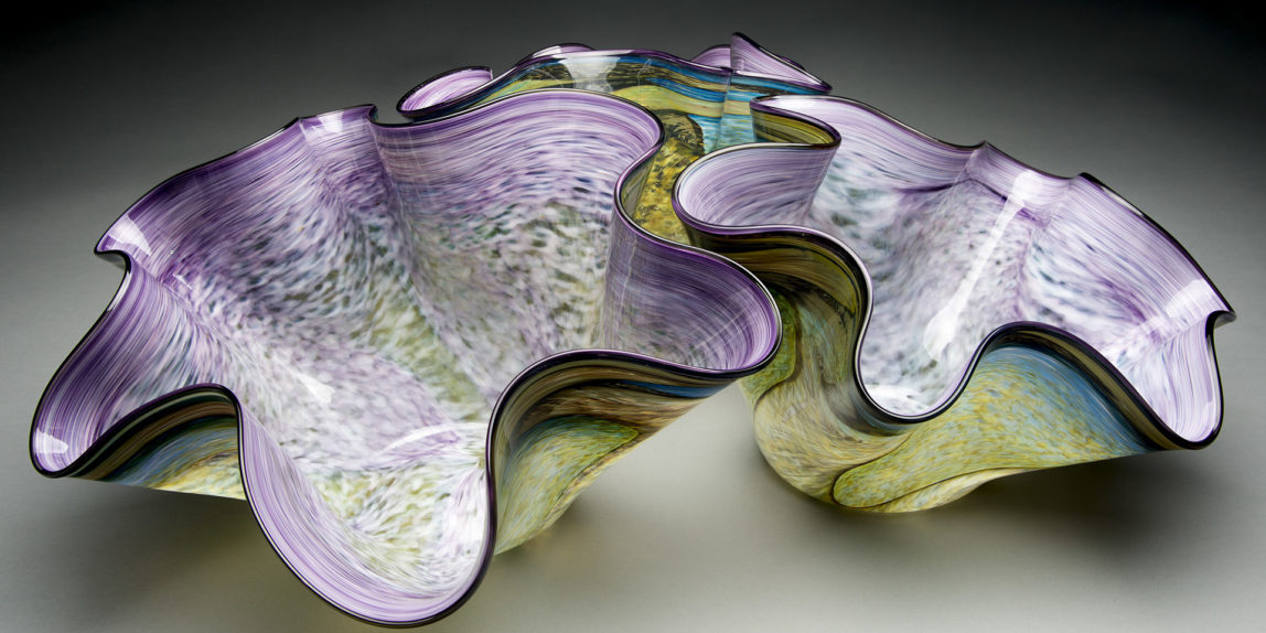 Three interlocking wavy glass bowls. Blown glass by Henry Lavine, Snowville Oh